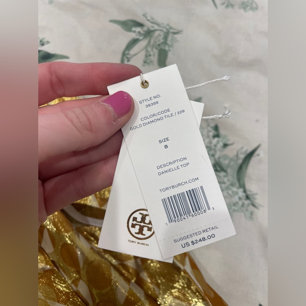 Tory Burch tassel too